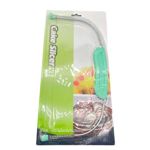 Cake slicer with green handle in packaging on a white background