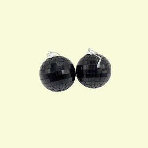 Black disco ball earrings on a white background
