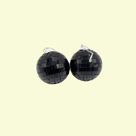 Black disco ball earrings on a white background